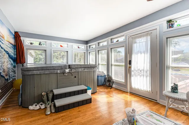 a room with furniture and a large window