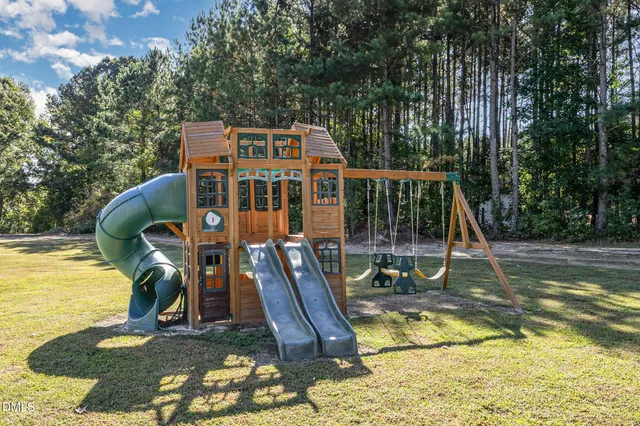 a view of a house with swimming pool