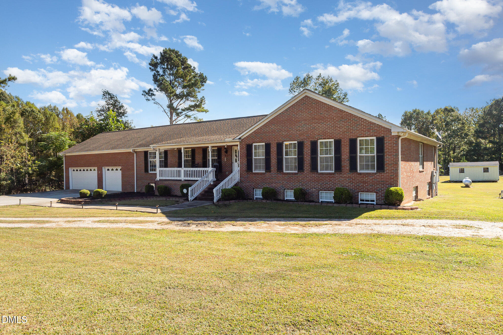 376-t K T K Allen Road Louisburg, NC 27549 - Photo 3 of 39 a front view of a house with a yard