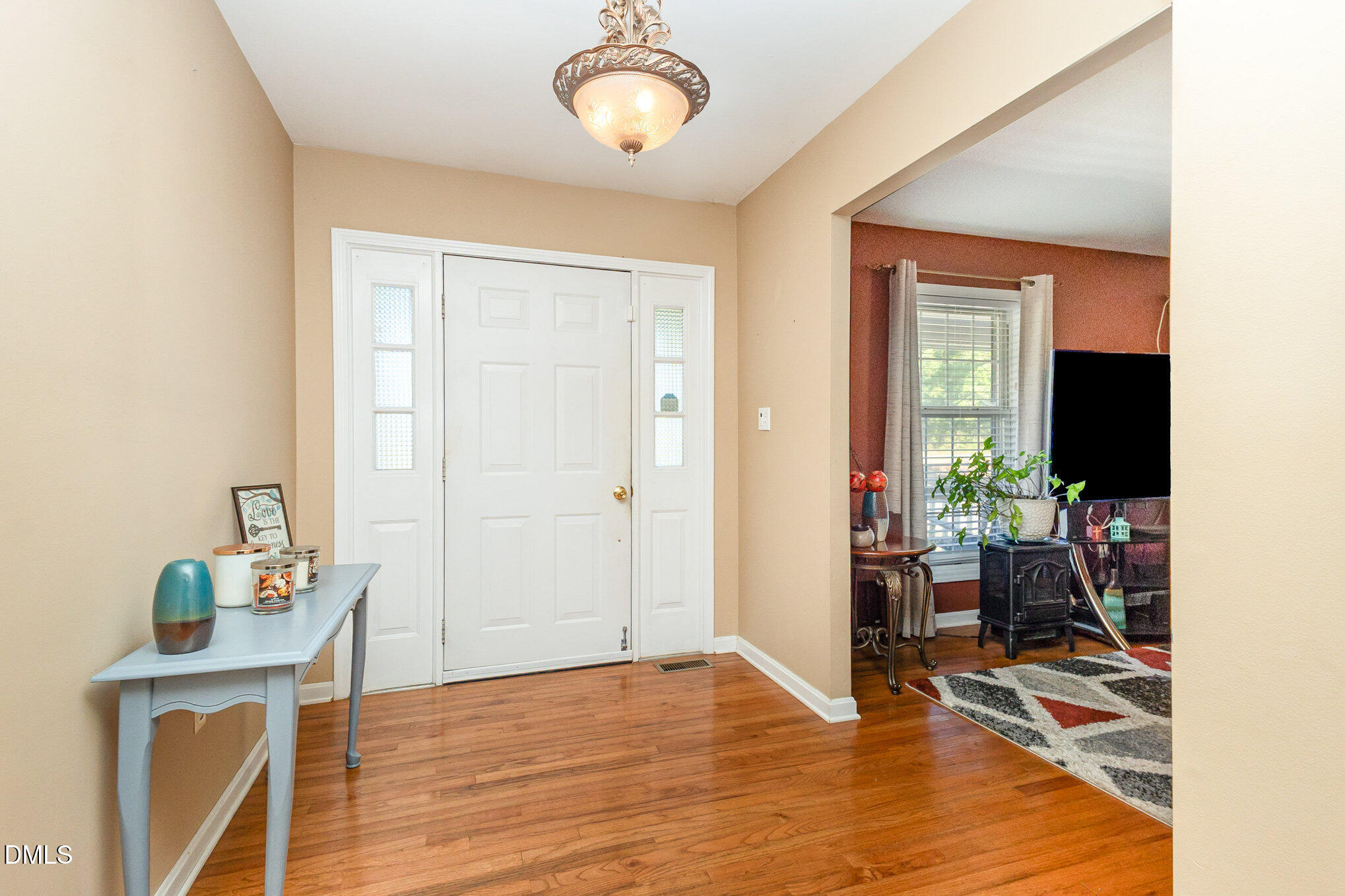 376-t K T K Allen Road Louisburg, NC 27549 - Photo 8 of 39 a view of a dining room with furniture window and wooden floor