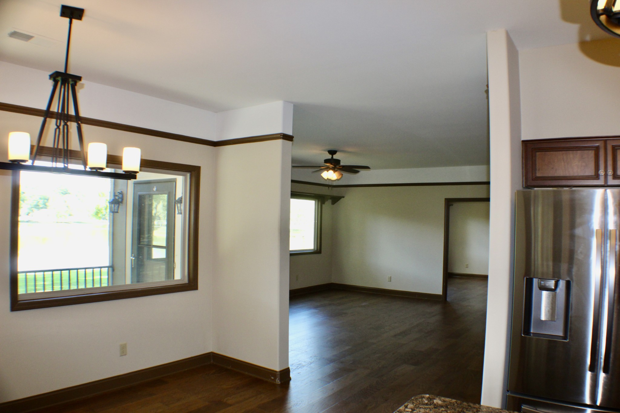 935 Lakeview Drive Collierville, TN 38017 - Photo 53 of 82 a view of an empty room with wooden floor and a window