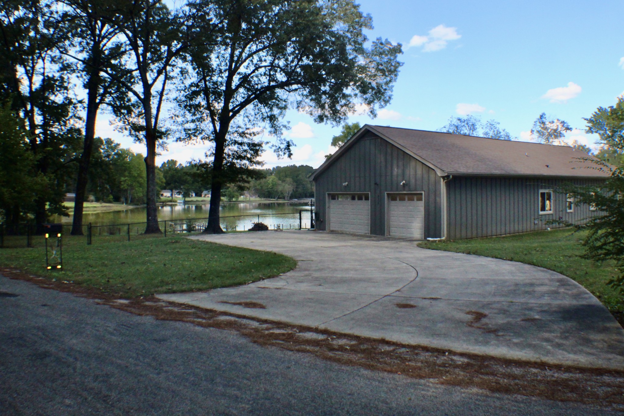 935 Lakeview Drive Collierville, TN 38017 - Photo 9 of 82 a front view of a house with a yard and trees