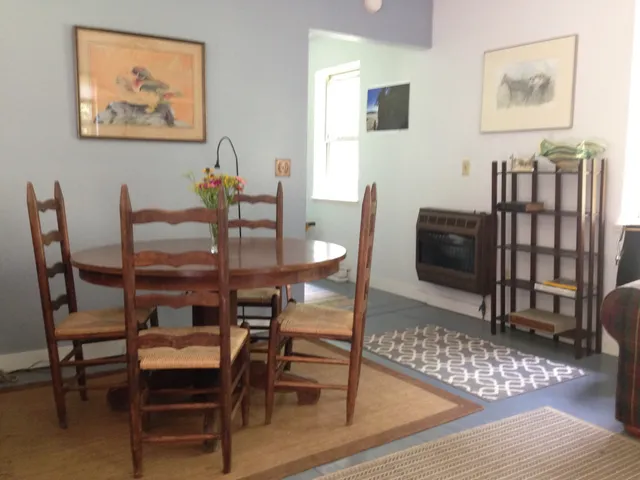 a view of a dining room with furniture