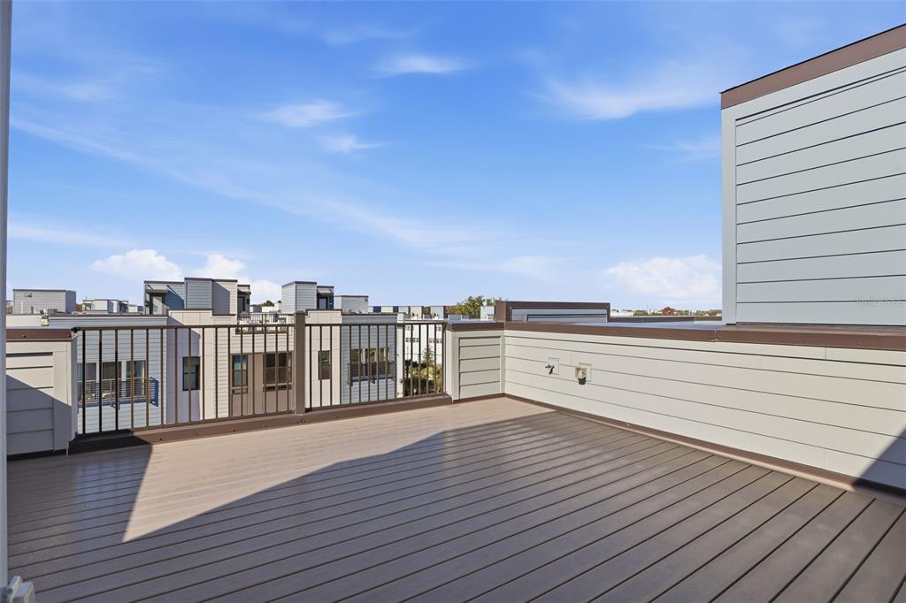 2174 Whitney Marsh Alley Orlando, FL 32804 - Photo 27 of 50 a view of a balcony with wooden floor