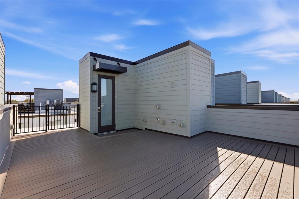 2174 Whitney Marsh Alley Orlando, FL 32804 - Photo 28 of 50 a view of a balcony with wooden floor and fence