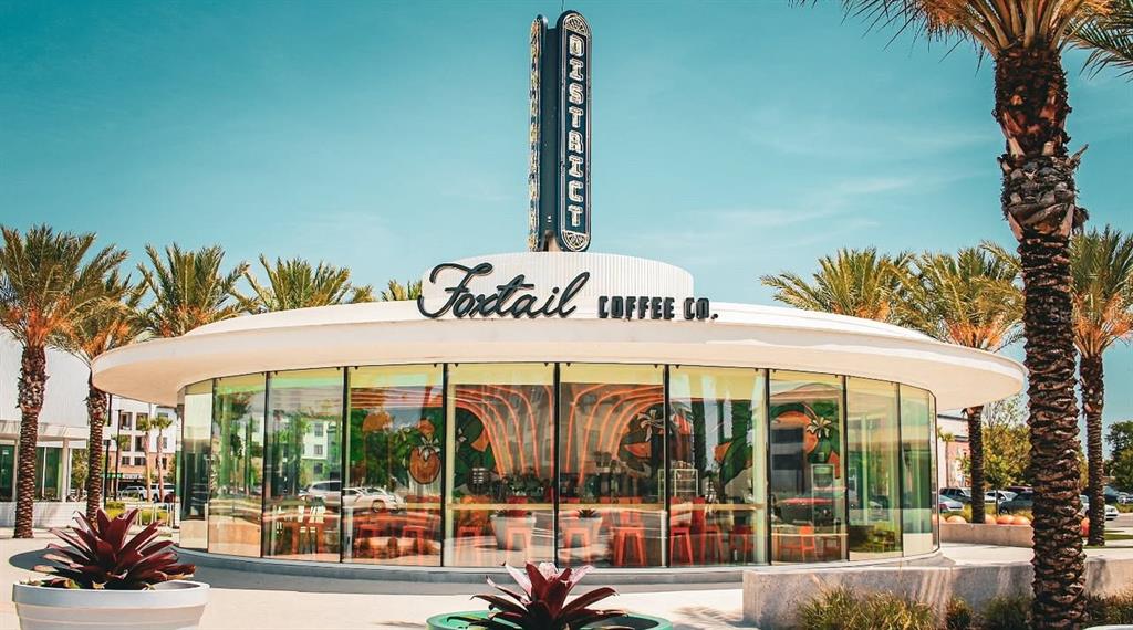 2174 Whitney Marsh Alley Orlando, FL 32804 - Photo 41 of 50 a front view of a building with traffic signal lights