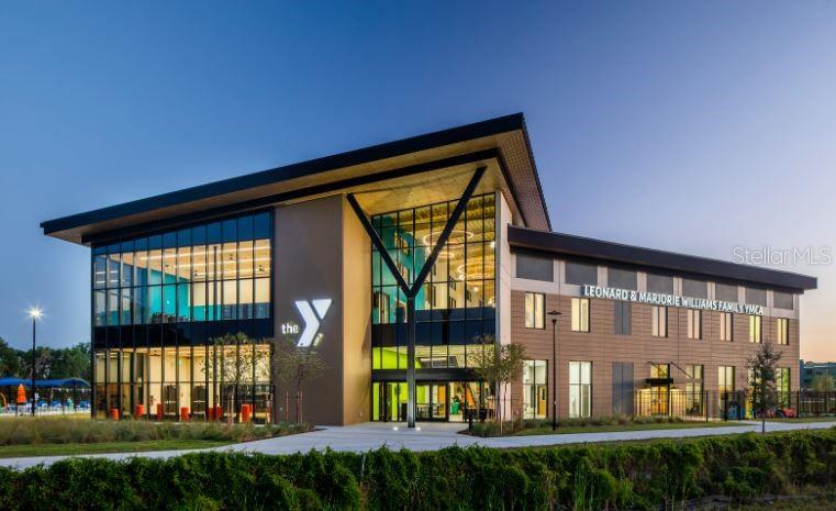 2174 Whitney Marsh Alley Orlando, FL 32804 - Photo 48 of 50 a front view of a house with a yard