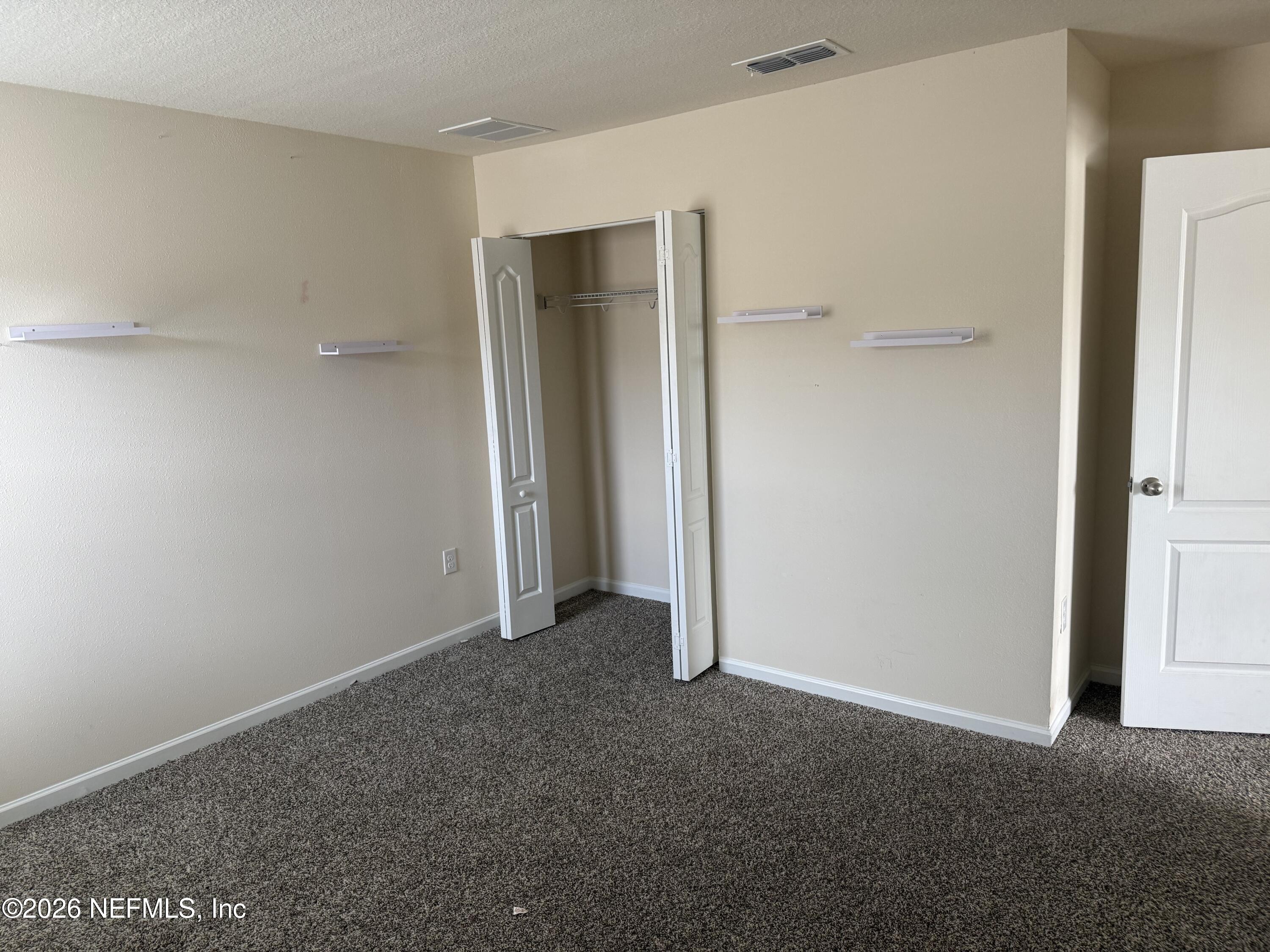 150 Aveiro Way Street St. Augustine, FL 32084 - Photo 12 of 68 a view of an empty room