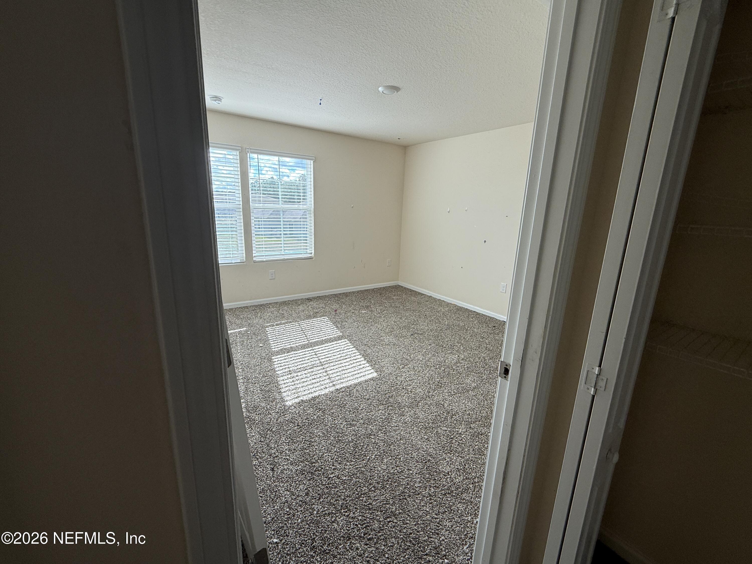 150 Aveiro Way Street St. Augustine, FL 32084 - Photo 34 of 68 a view of an empty room and window
