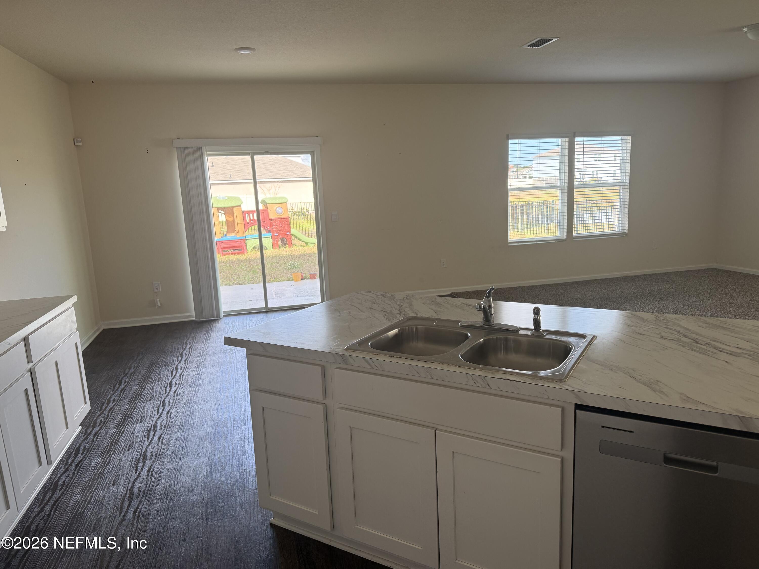 150 Aveiro Way Street St. Augustine, FL 32084 - Photo 5 of 68 a kitchen with sink and window