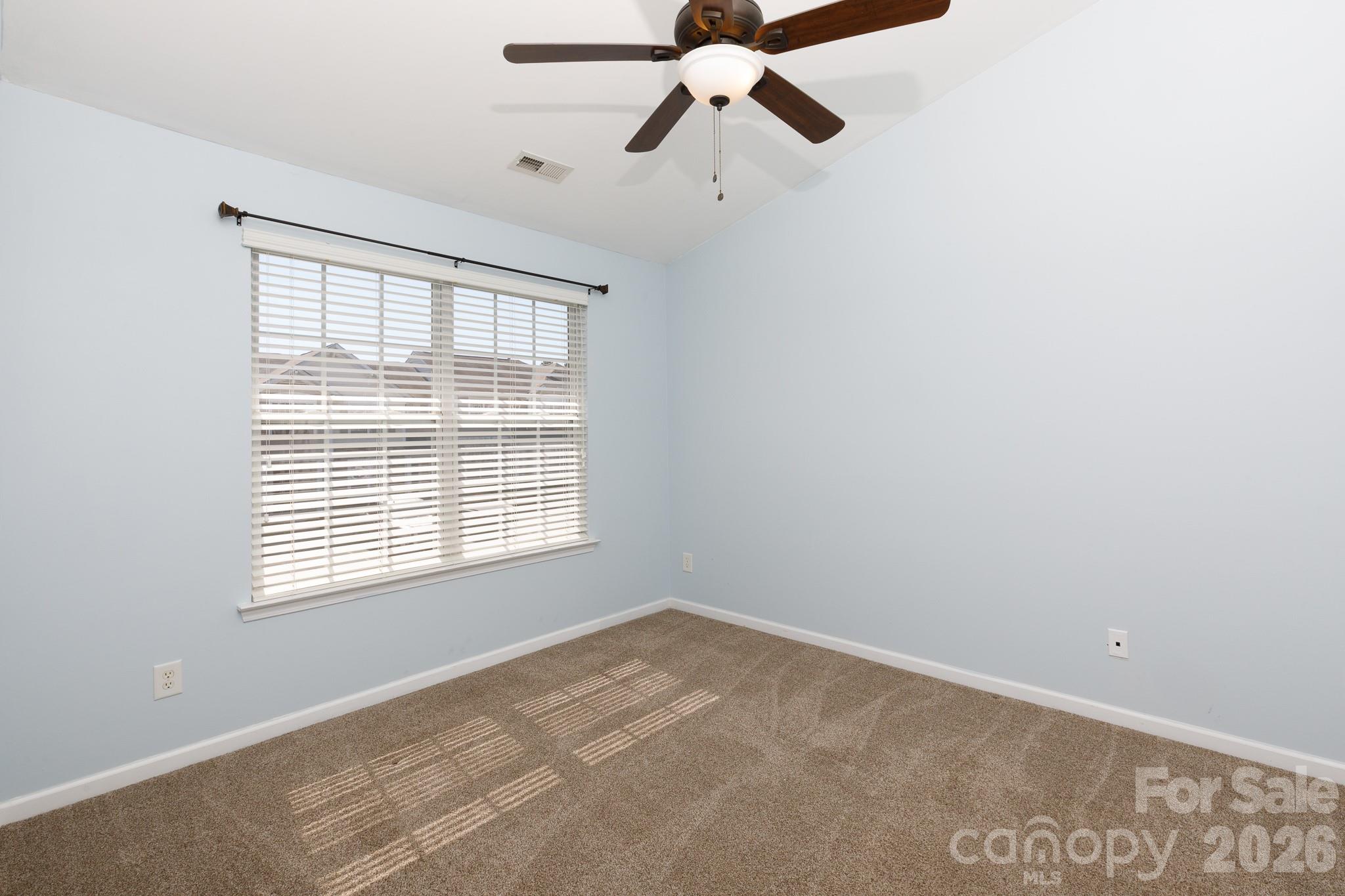 824 Gentlewinds Court Fort Mill, SC 29708 - Photo 12 of 30 a view of an empty room with a window