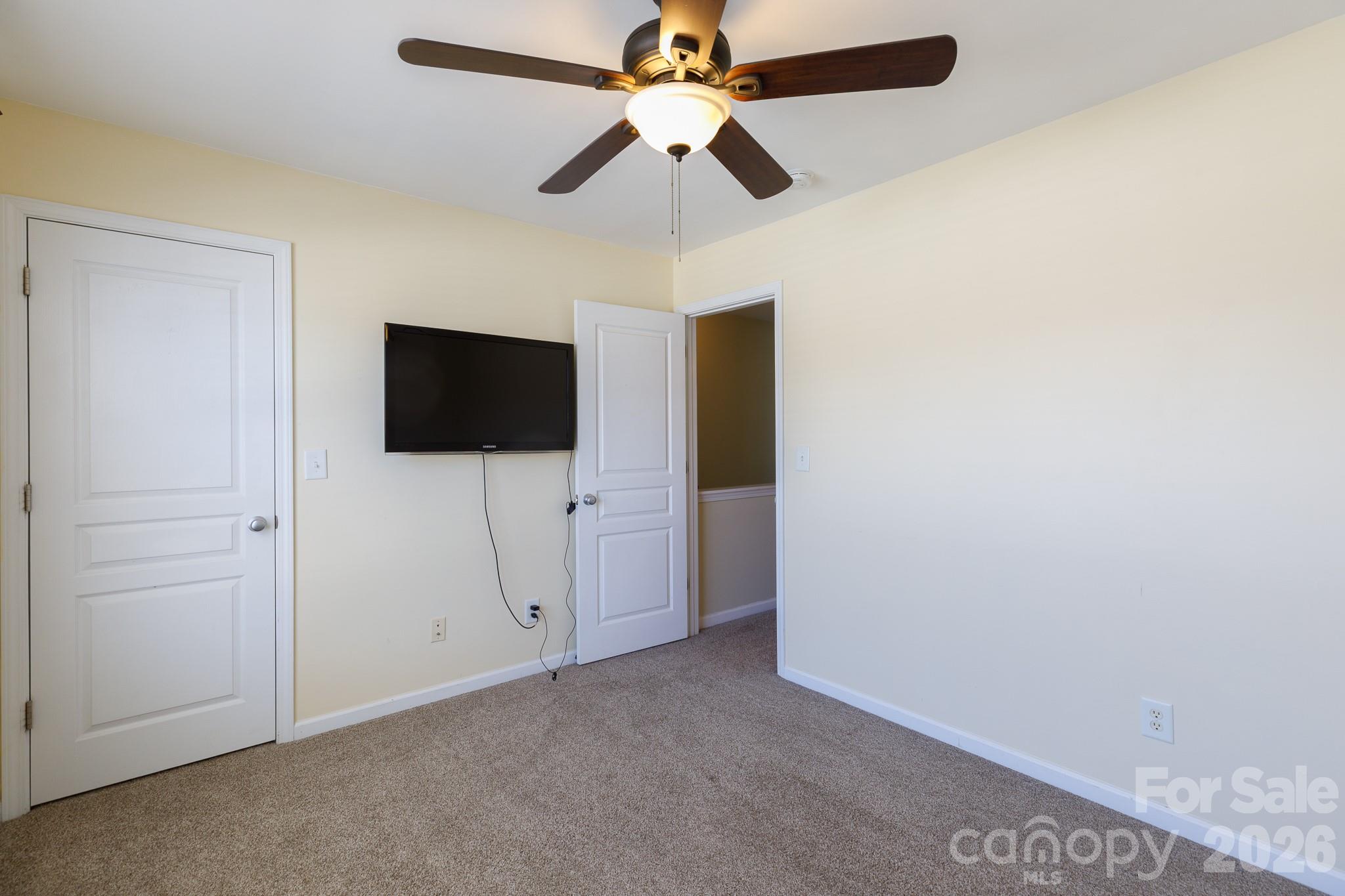 824 Gentlewinds Court Fort Mill, SC 29708 - Photo 18 of 30 a view of a livingroom with a flat screen tv