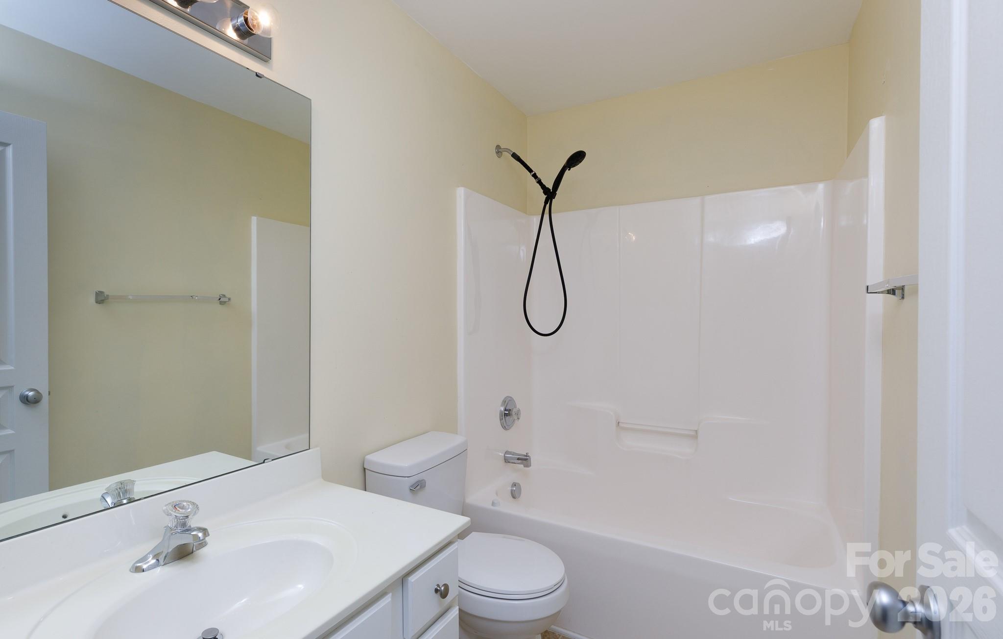 824 Gentlewinds Court Fort Mill, SC 29708 - Photo 20 of 30 a bathroom with a sink toilet and shower
