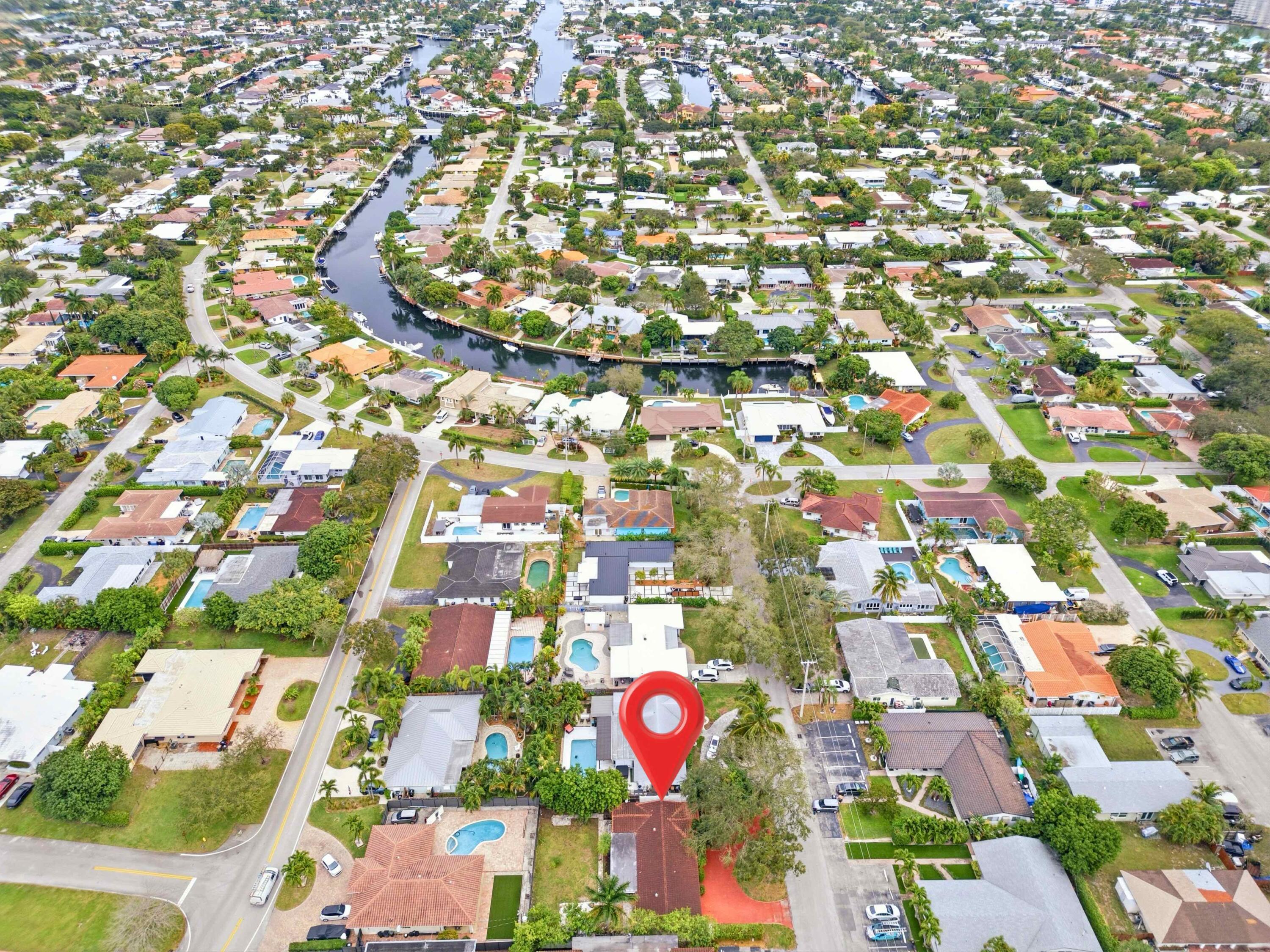 1921 Northeast 28th Court Lighthouse Point, FL 33064 - Photo 35 of 39 an aerial view of city and parking