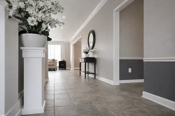 a view of a livingroom with furniture and a potted plant