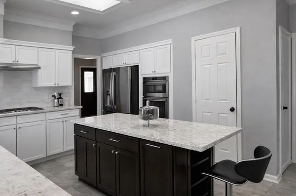 a dining room with furniture and a chandelier