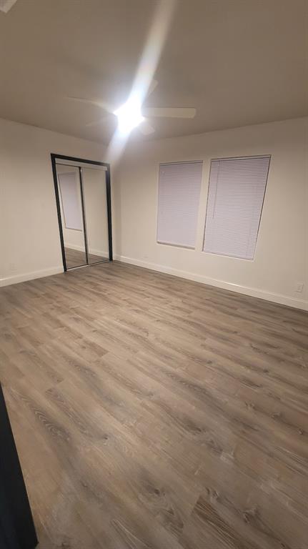 1204 Live Oak Street Commerce, TX 75428 - Photo 11 of 14 a view of an empty room with a window