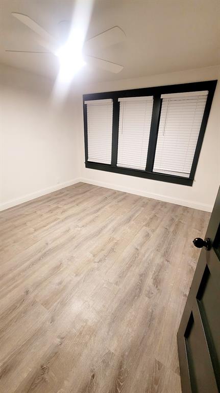 1204 Live Oak Street Commerce, TX 75428 - Photo 6 of 14 a view of an empty room