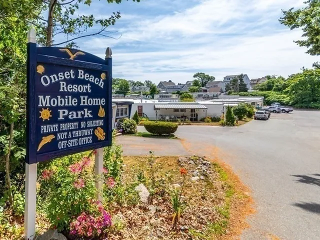 a view of swimming pool with sitting area