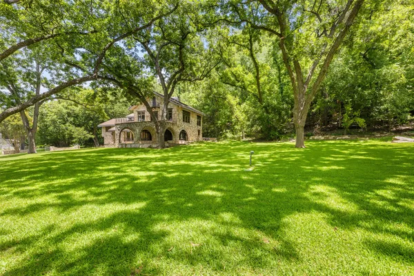 a house view with a outdoor space