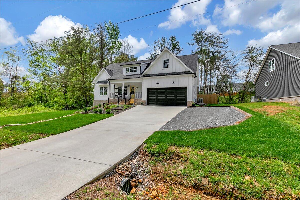 371 Riddle Road Dayton, TN 37321 - Photo 3 of 33 2 Car Garage with extra parking area