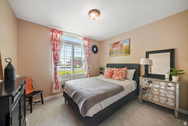 357 South 320 W Street Lindon, UT 84042 - Photo 14 of 41 Bedroom with neutral wall color and light-toned carpeting