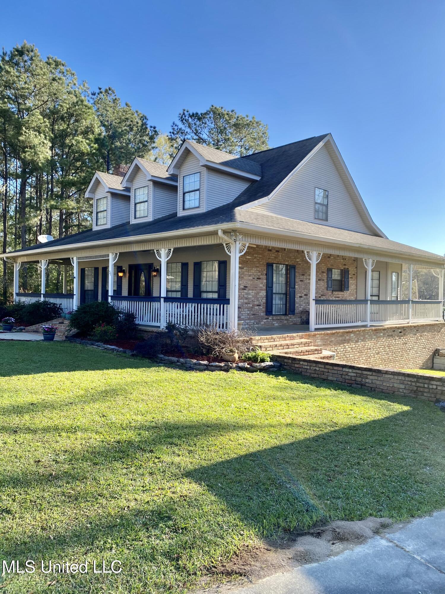 31 Cove Lake Road Carriere, MS 39426 - Photo 2 of 51 2 Front view, IMG_2589