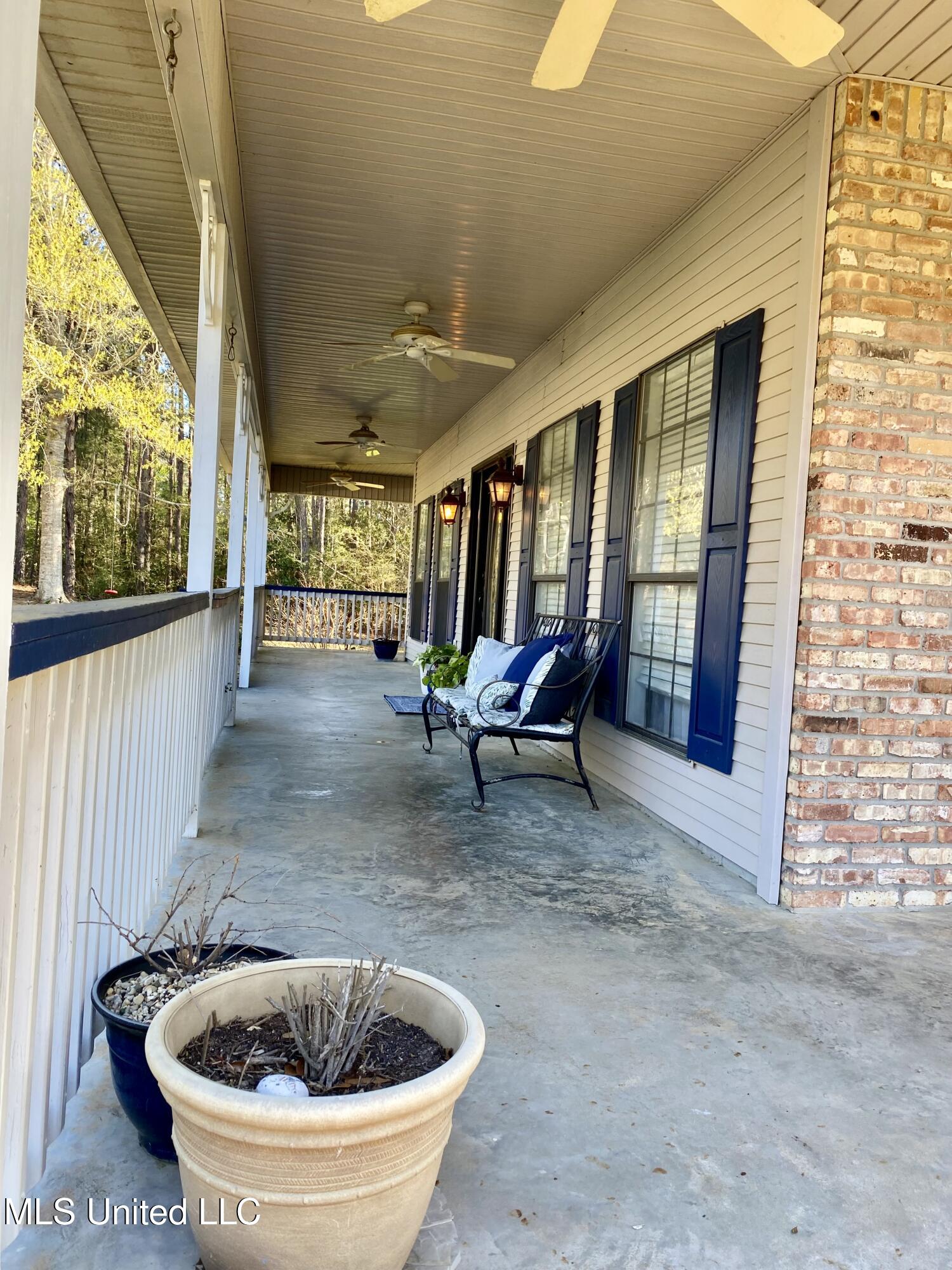 31 Cove Lake Road Carriere, MS 39426 - Photo 8 of 51 7 Front porch, IMG_2590