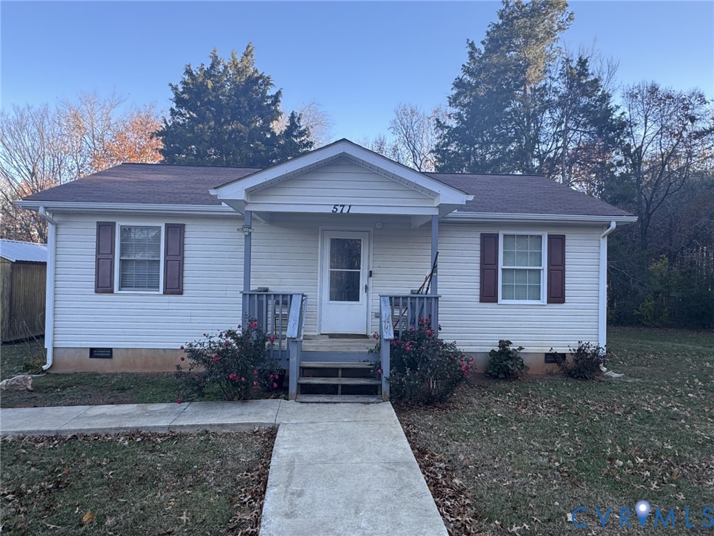 Bungalow with crawl space, a porch, roof with shin