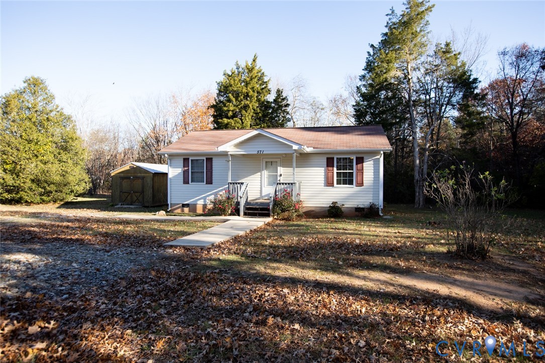 571 Five Forks Road Pamplin, VA 23958 - Photo 8 of 50 a front view of a house with a yard