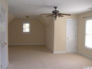 1120 Legacy Lane Fort Mill, SC 29708 - Photo 8 of 15 an empty room with windows and closet
