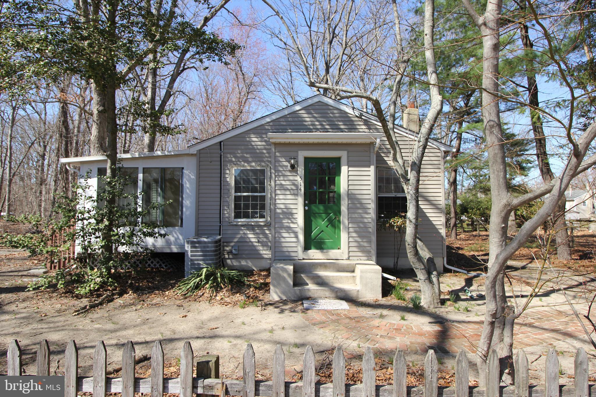 514 Hartford Road Mount Laurel, NJ 08054 - Photo 1 of 22 a backyard of a house with seating space