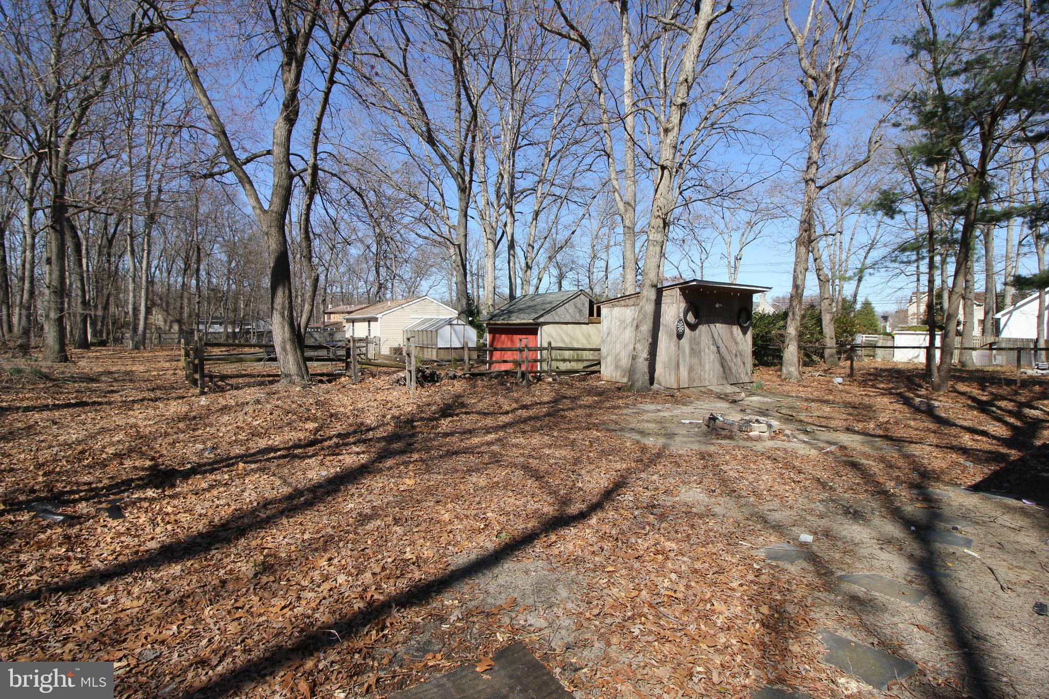 514 Hartford Road Mount Laurel, NJ 08054 - Photo 20 of 22 a backyard of a house with lots of green space