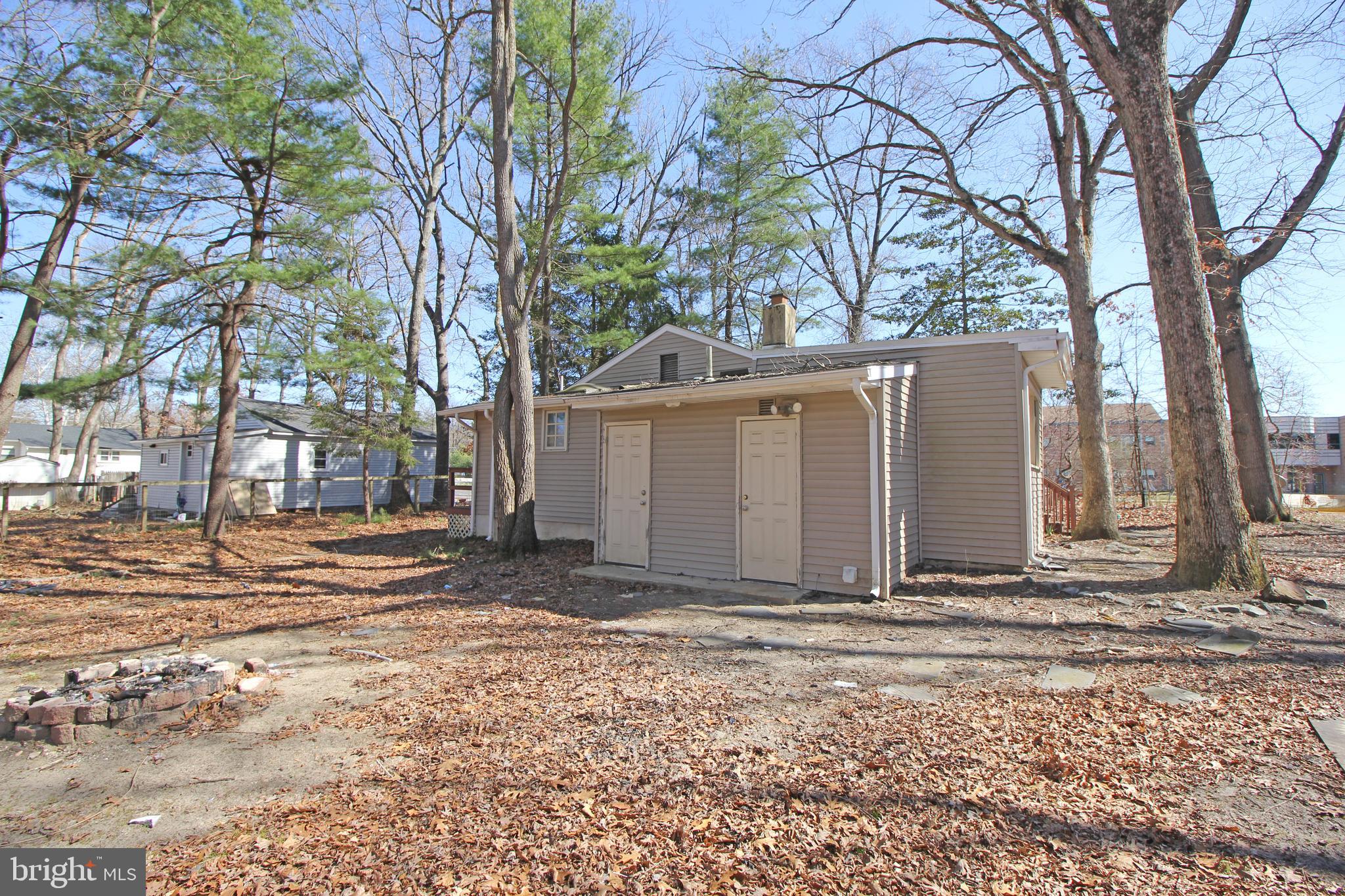 514 Hartford Road Mount Laurel, NJ 08054 - Photo 21 of 22 a house with trees in front of it