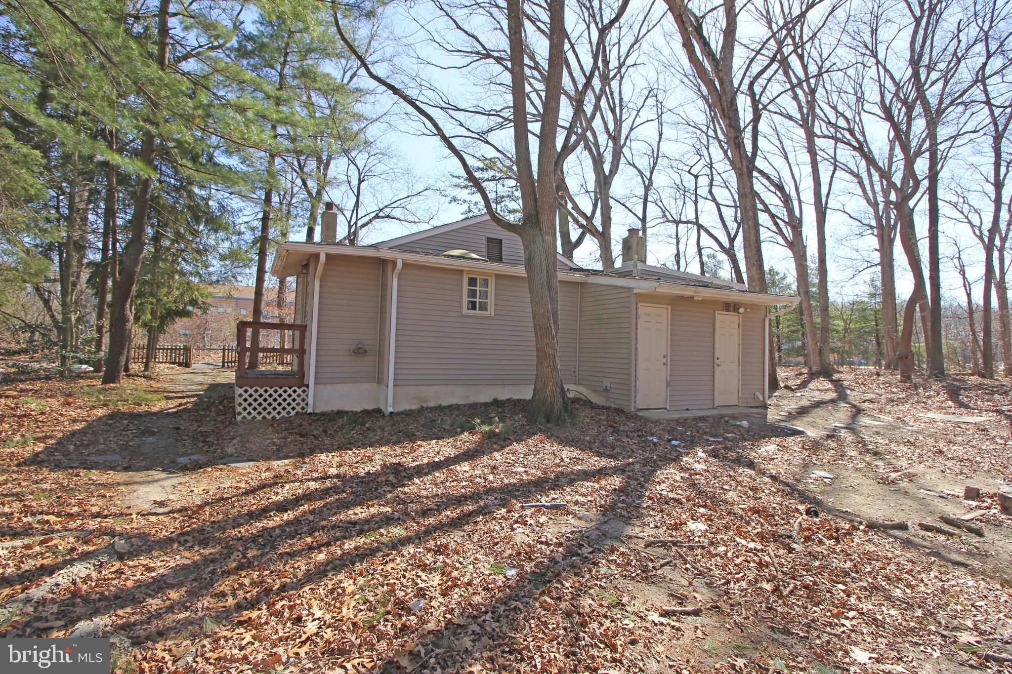 514 Hartford Road Mount Laurel, NJ 08054 - Photo 22 of 22 a view of a house with a yard covered in snow