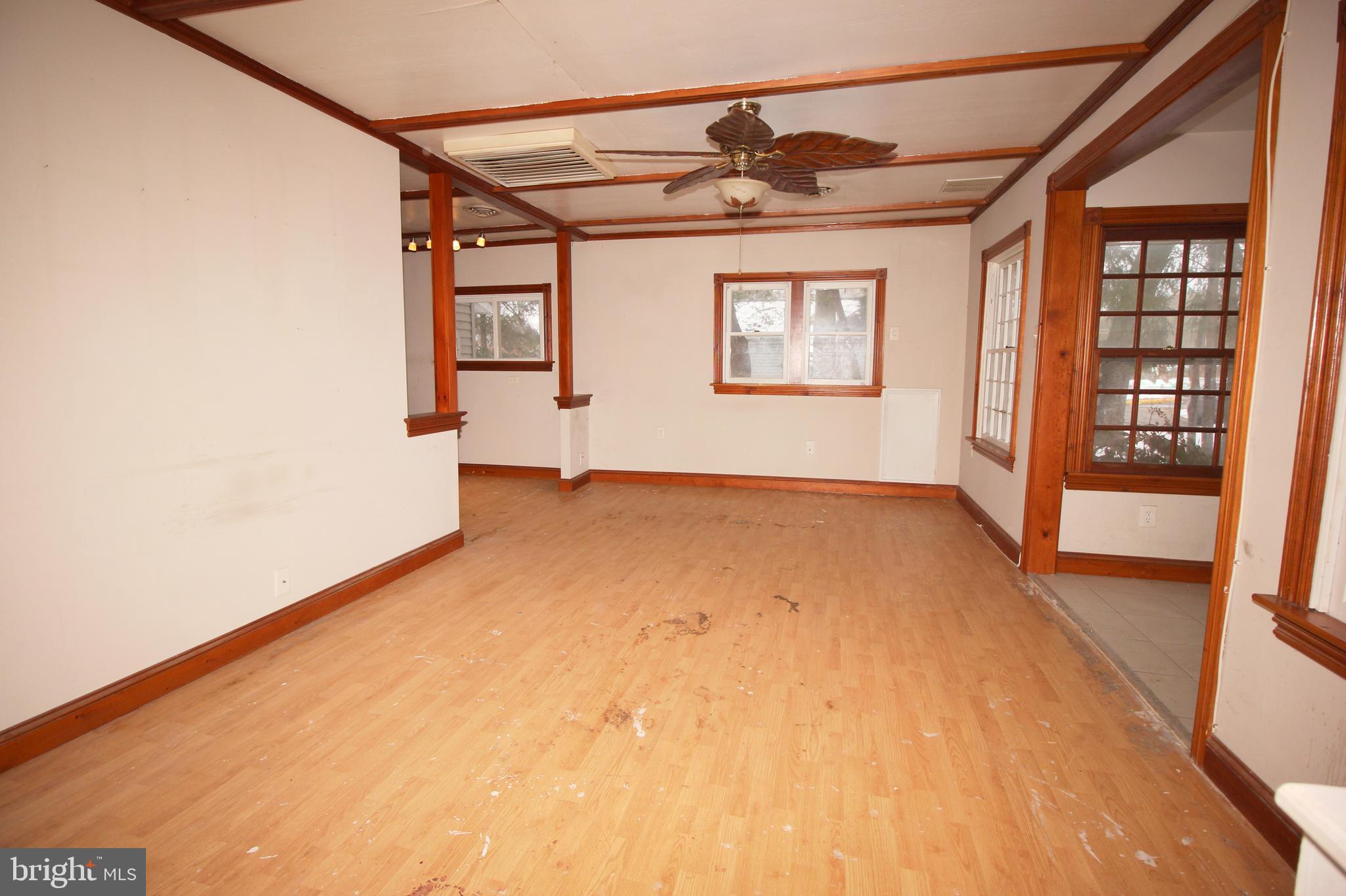 514 Hartford Road Mount Laurel, NJ 08054 - Photo 5 of 22 a view of a big room with wooden floor and windows
