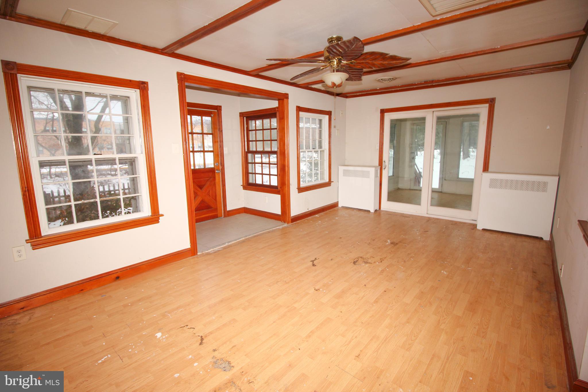 514 Hartford Road Mount Laurel, NJ 08054 - Photo 7 of 22 a view of an empty room with a window and wooden floor