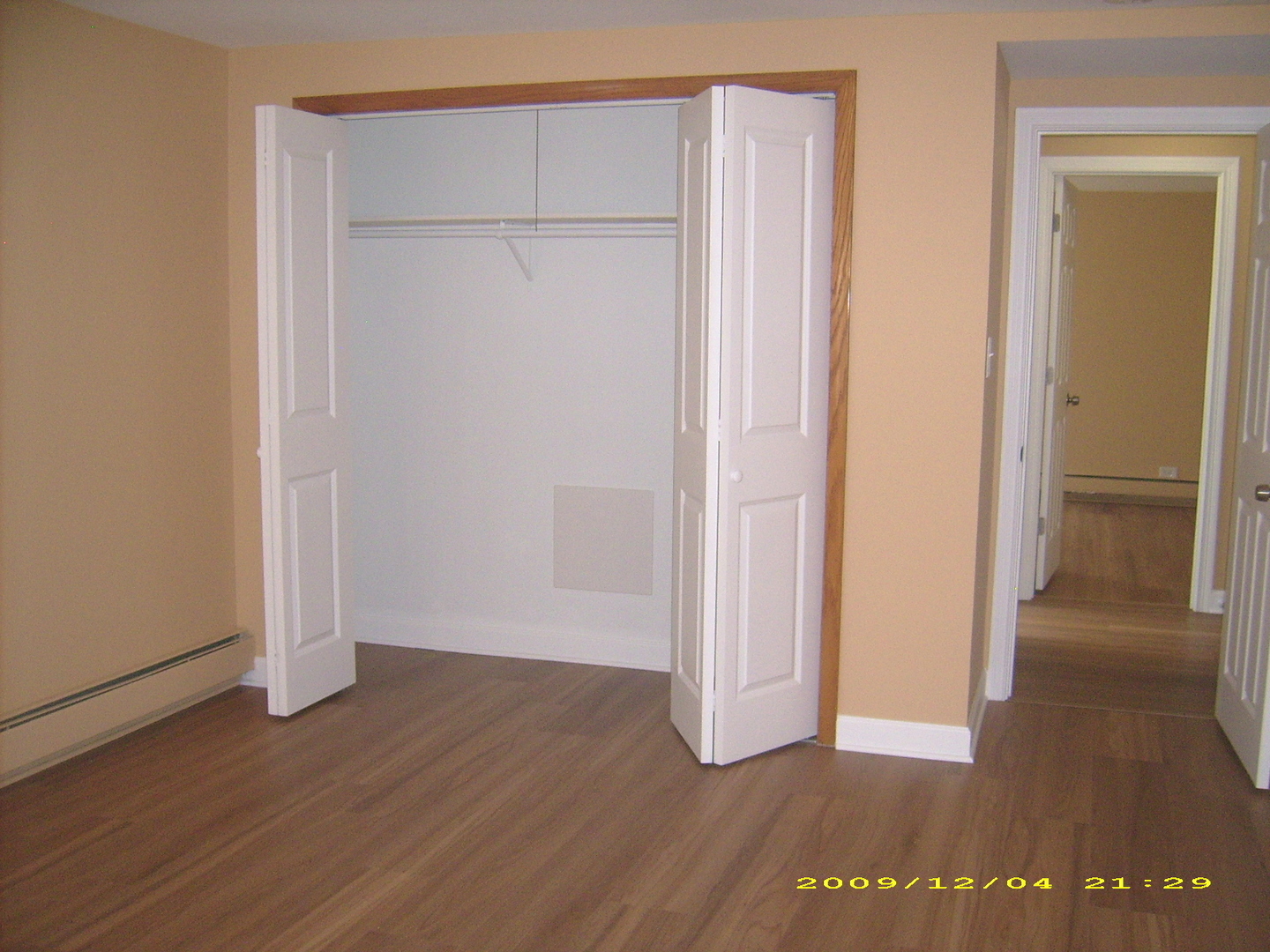 7019 West Irving Park Road, Unit 2 Chicago, IL 60634 - Photo 13 of 14 a view of an empty room with wooden floor