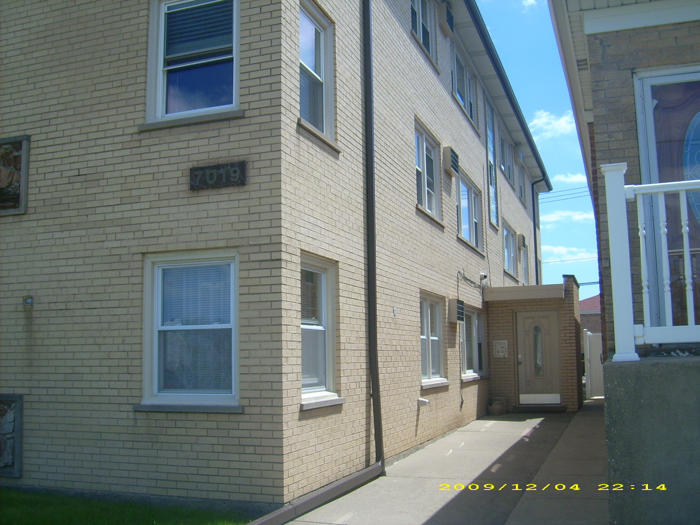 7019 West Irving Park Road, Unit 2 Chicago, IL 60634 - Photo 14 of 14 a view of a brick buildings with entryway doors