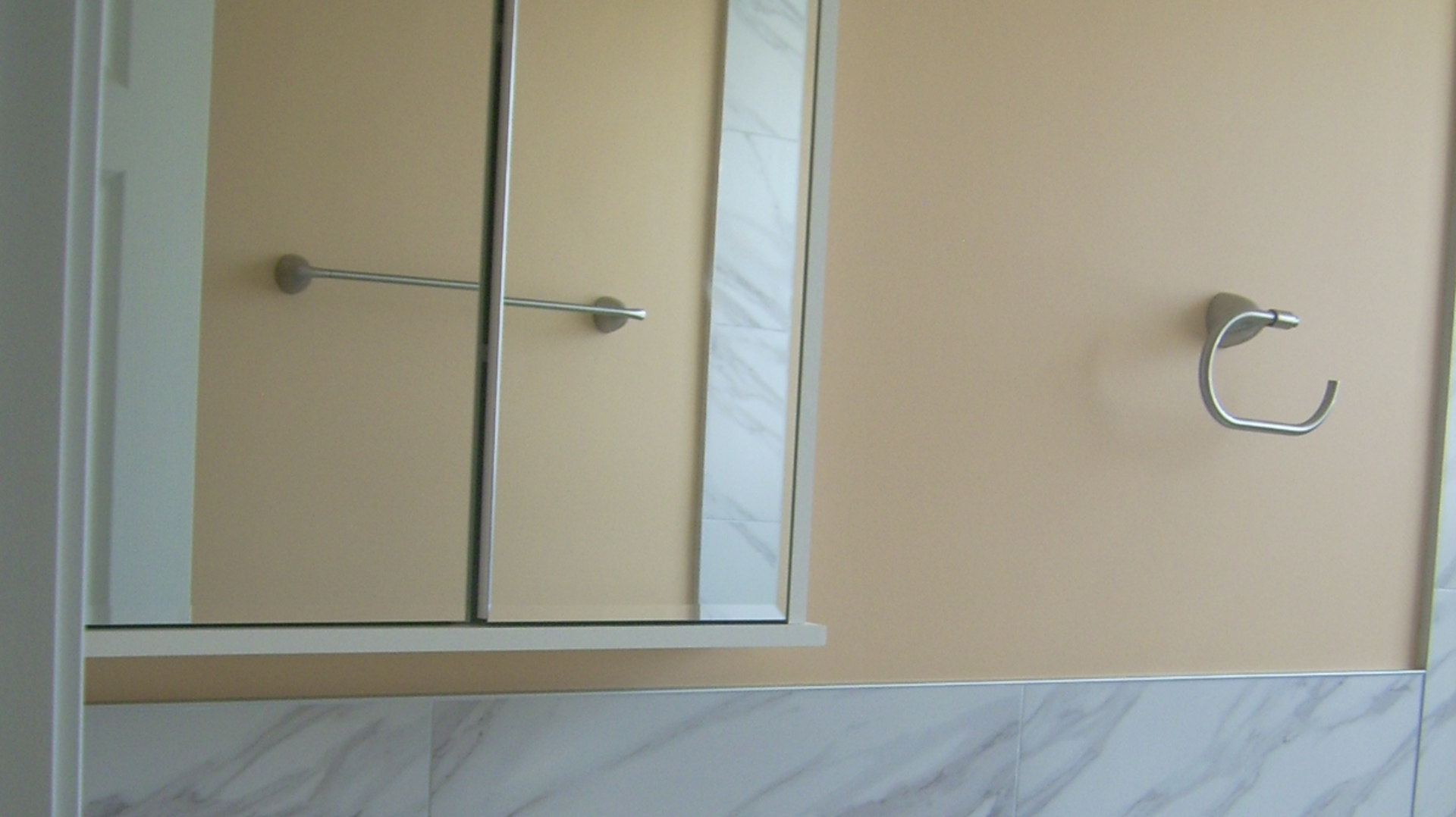 7019 West Irving Park Road, Unit 2 Chicago, IL 60634 - Photo 9 of 14 a bathroom with a glass shower door