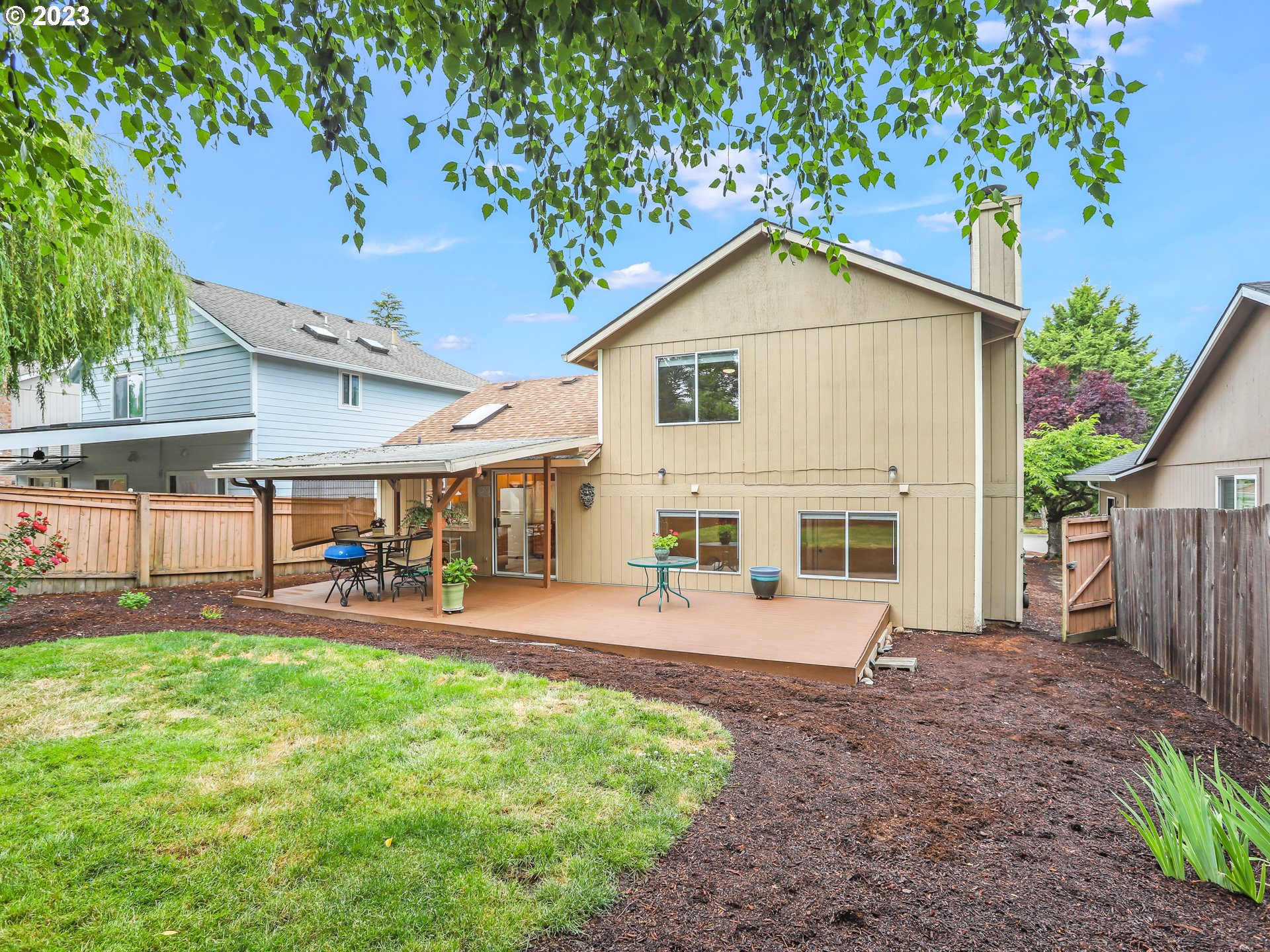 13224 Southwest Shore Drive Portland, OR 97223 - Photo 29 of 30 a view of a house with backyard and sitting area