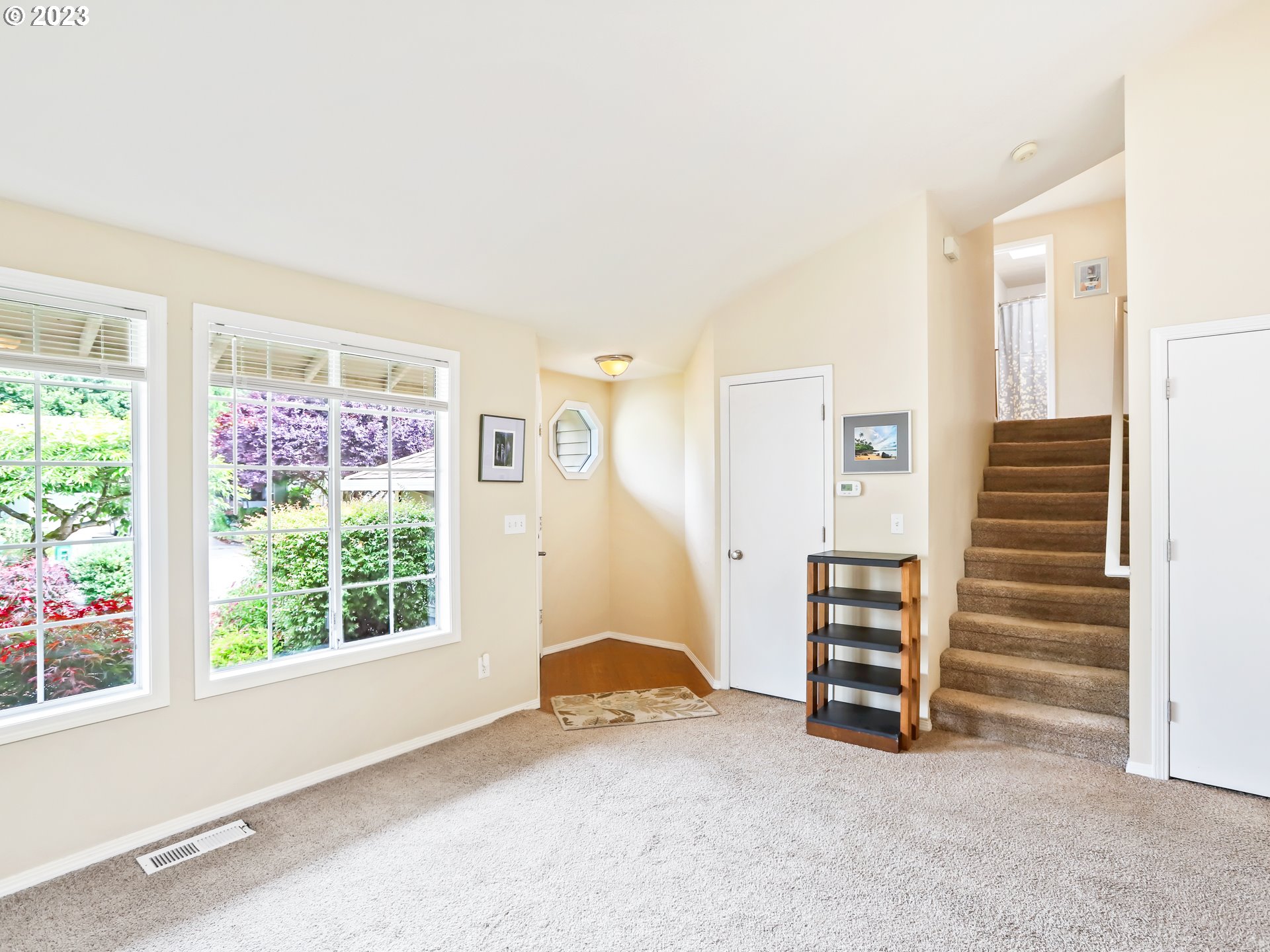 13224 Southwest Shore Drive Portland, OR 97223 - Photo 8 of 30 a view of room with stairs and a window