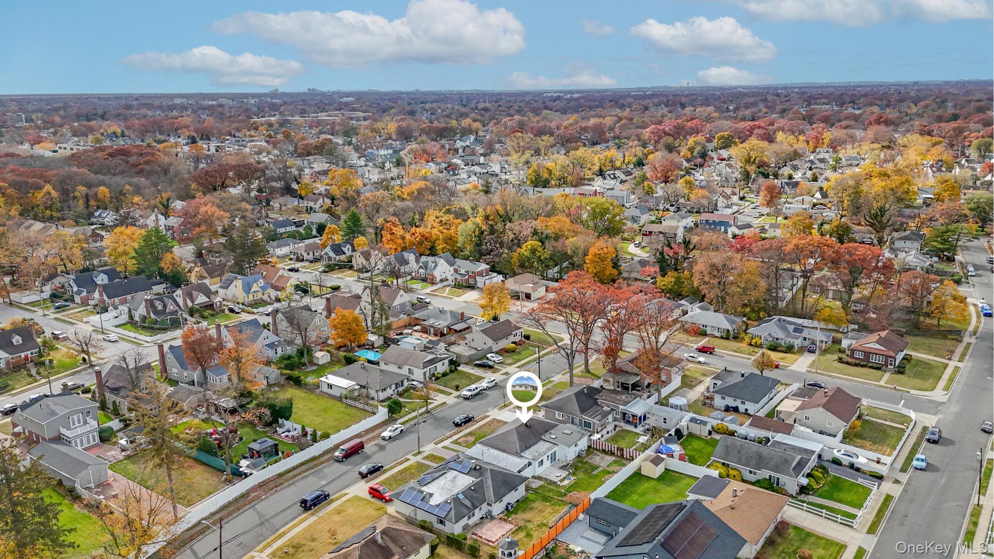 312 Coventry Road South West Hempstead, NY 11552 - Photo 9 of 30 Aerial view of property and surrounding area with nearby suburban area
