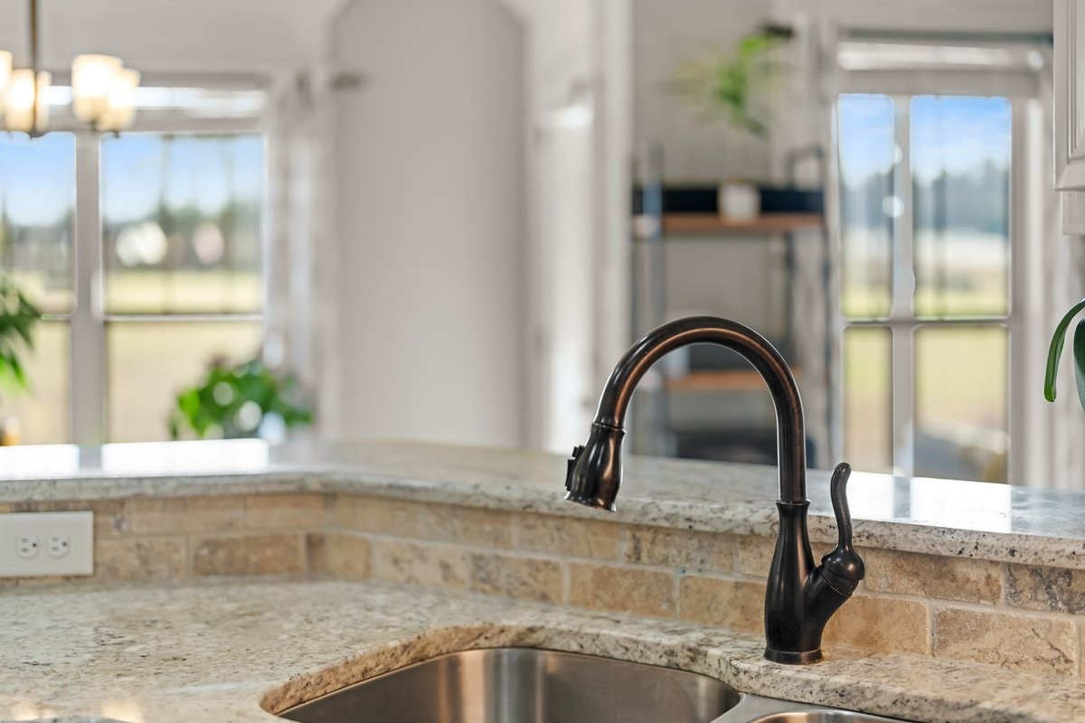 70 Cherokee Dock Road Lebanon, TN 37087 - Photo 12 of 48 a kitchen with a faucet a sink and a window