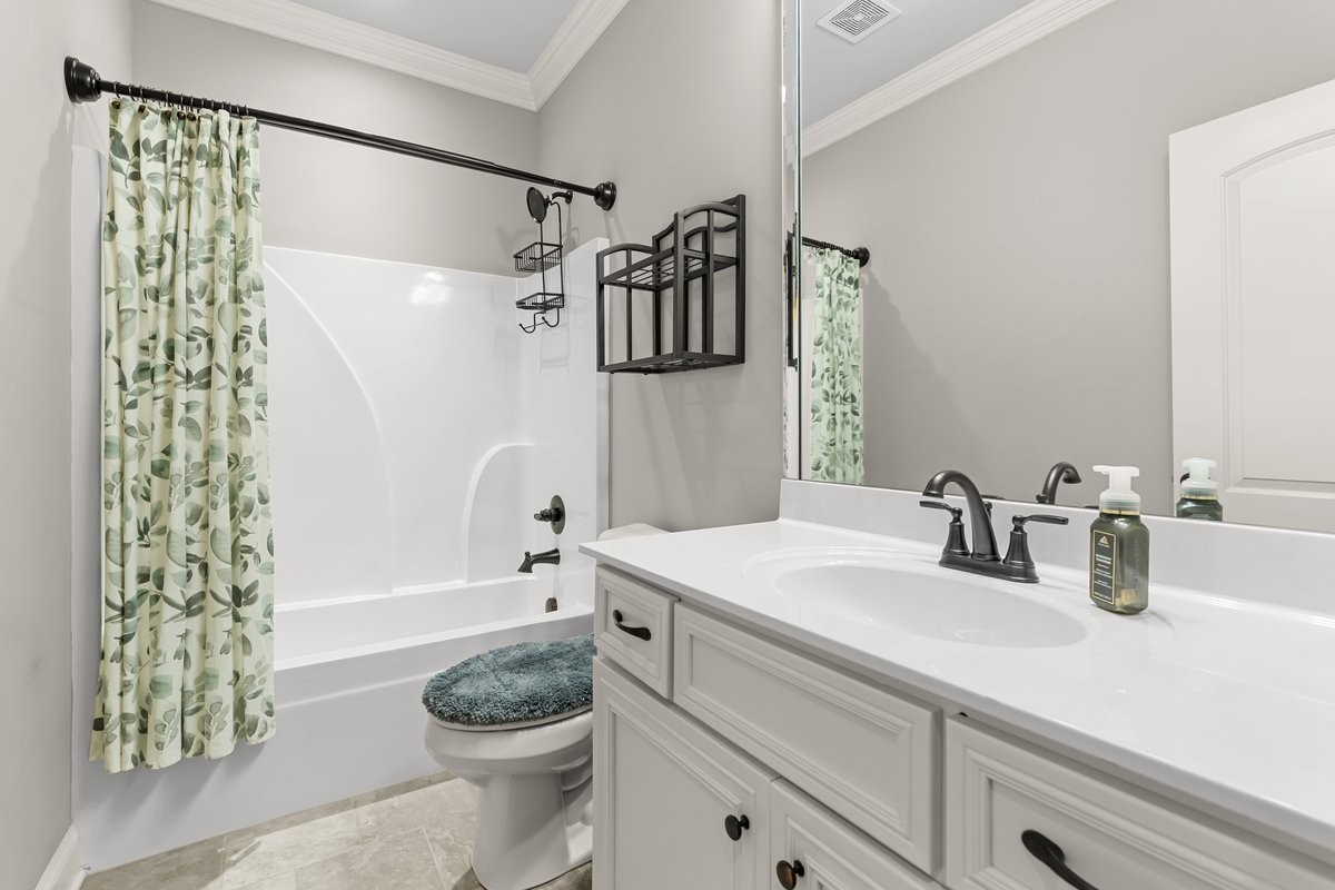 70 Cherokee Dock Road Lebanon, TN 37087 - Photo 30 of 48 a bathroom with a sink a toilet and shower