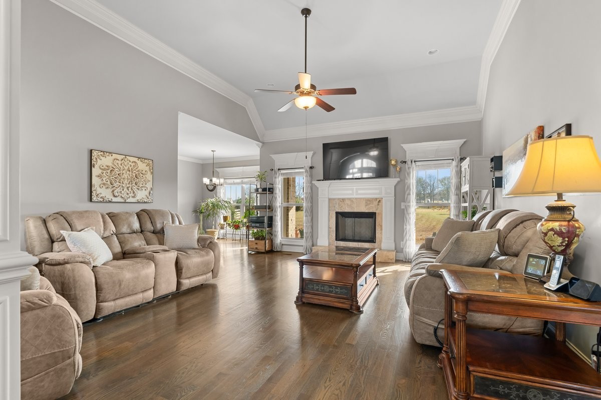 70 Cherokee Dock Road Lebanon, TN 37087 - Photo 3 of 48 a living room with furniture fireplace and a chandelier