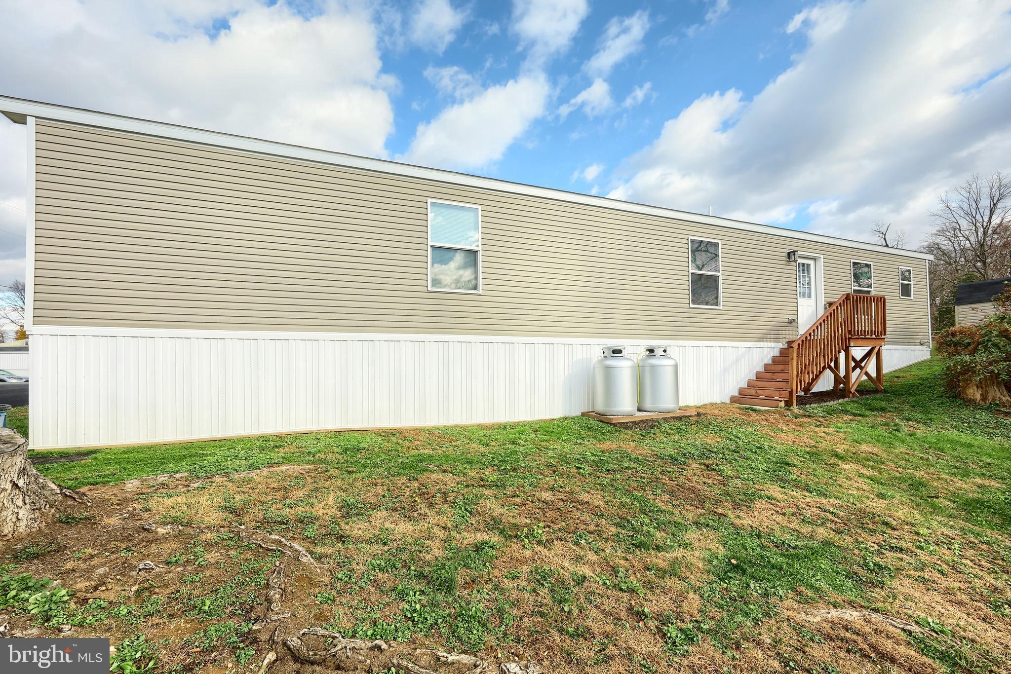 4 3rd Street York, PA 17406 - Photo 26 of 26 a view of a backyard with plants and a large tree