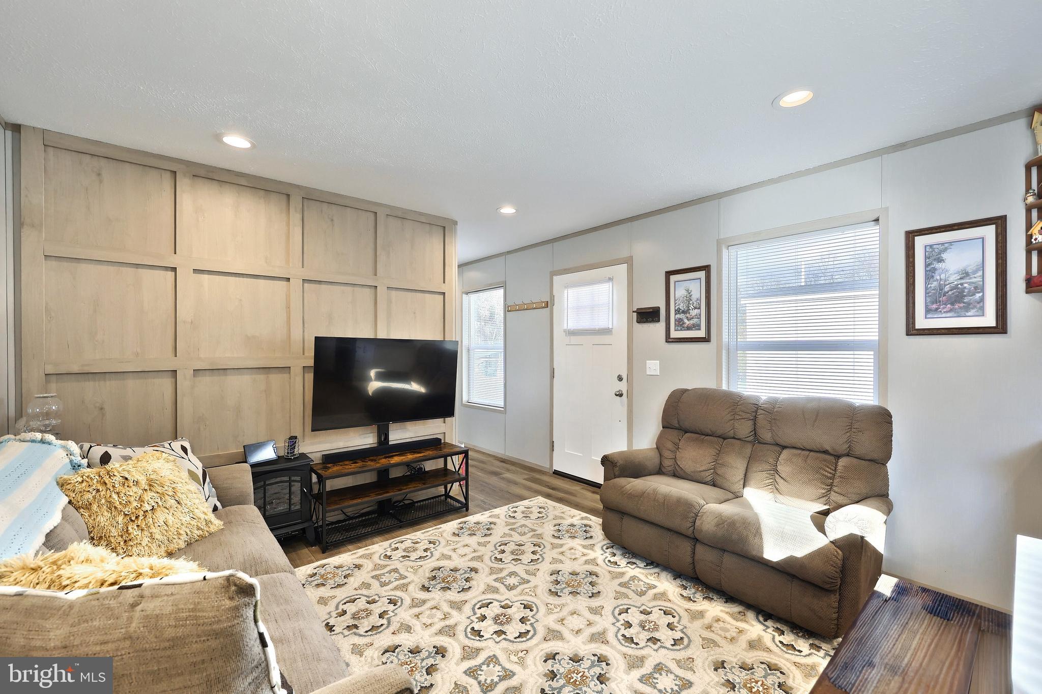 4 3rd Street York, PA 17406 - Photo 5 of 26 a living room with furniture and a flat screen tv