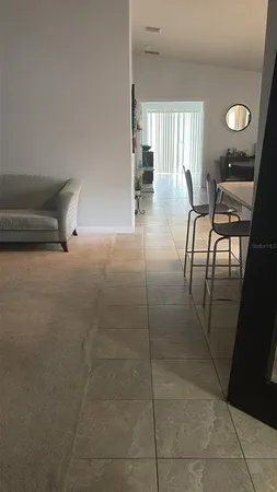 a lobby with furniture and window