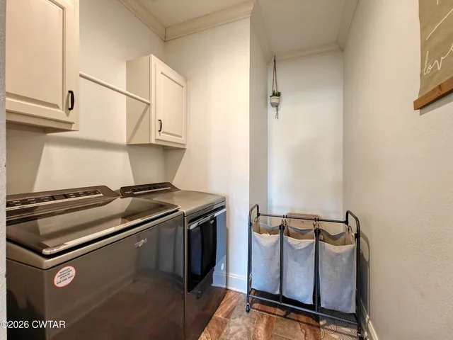 a view of a house with swimming pool and furniture